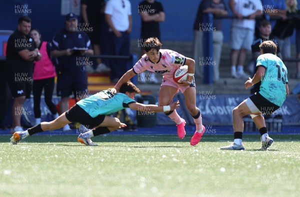 230826 - Cardiff Rugby U18 v Ospreys U18, WRU Regional Age Grade Championship - Devon Morris of Cardiff Rugby is tackled