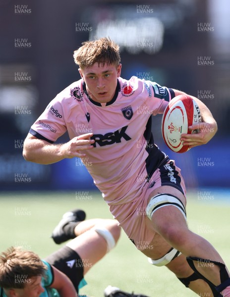 230826 - Cardiff Rugby U18 v Ospreys U18, WRU Regional Age Grade Championship - Liam Williams of Cardiff Rugby gets past Ronan Hire of Ospreys