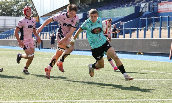 230826 - Cardiff Rugby U18 v Ospreys U18, WRU Regional Age Grade Championship - Dylan Quin of Ospreys races in to score try