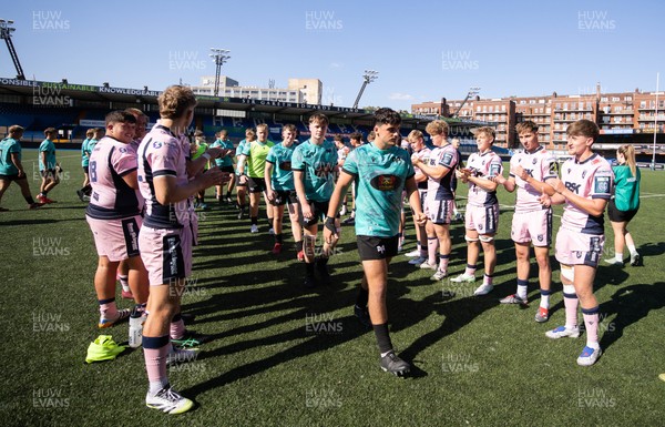 230826 - Cardiff Rugby U18 v Ospreys U18, WRU Regional Age Grade Championship - Ospreys are applauded off the pitch by the Cardiff team