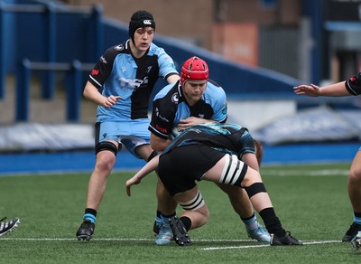 230225  Cardiff Rugby U18s v Ospreys U18s, WQRU Regional Age Grade Championship Final - Jack Clease of Cardiff Rugby takes on Alfie Thomas of Ospreys