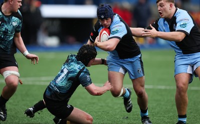 230225  Cardiff Rugby U18s v Ospreys U18s, WRU Regional Age Grade Championship Final - Tom Howe of Cardiff Rugby takes on Thomas Edwards of Ospreys