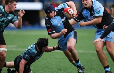 230225  Cardiff Rugby U18s v Ospreys U18s, WRU Regional Age Grade Championship Final - Tom Howe of Cardiff Rugby takes on Thomas Edwards of Ospreys