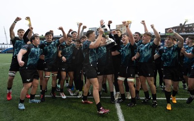 230225  Cardiff Rugby U18s v Ospreys U18s, WRU Regional Age Grade Championship Final - Ospreys players celebrate after winning the Final