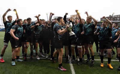 230225  Cardiff Rugby U18s v Ospreys U18s, WRU Regional Age Grade Championship Final - Ospreys players celebrate after winning the Final