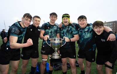 230225  Cardiff Rugby U18s v Ospreys U18s, WRU Regional Age Grade Championship Final - Ospreys players celebrate after winning the Final