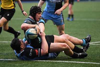 230225 - Cardiff Rugby U18s v Ospreys U18s - Regional Age-Grade Championship finals - Thomas Edwards of Ospreys U18s scores a try