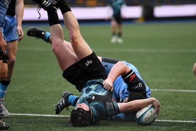 230225 - Cardiff Rugby U18s v Ospreys U18s - Regional Age-Grade Championship finals - Thomas Edwards of Ospreys U18s scores a try