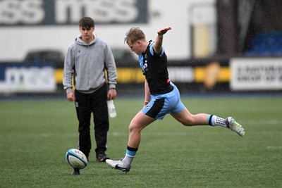 230225 - Cardiff Rugby U18s v Ospreys U18s - Regional Age-Grade Championship finals - Lloyd Lucas of Cardiff Rugby kicks a penalty