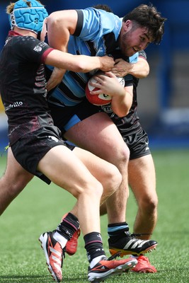 310825 - Cardiff Rugby U18s v RGC U18s - Ioan Dacey of Cardiff pushes the ball over the line to score a try
