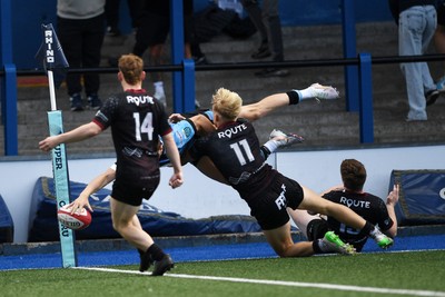310825 - Cardiff Rugby U18s v RGC U18s - Calen Edwards of Cardiff dives over to score a try