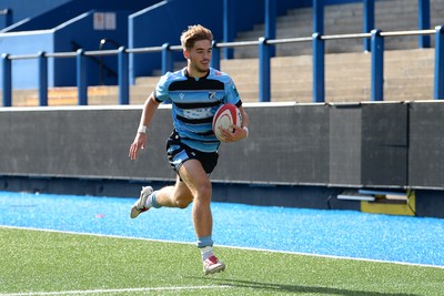310825 - Cardiff Rugby U18s v RGC U18s - Harvey Bryant of Cardiff runs in to score a try