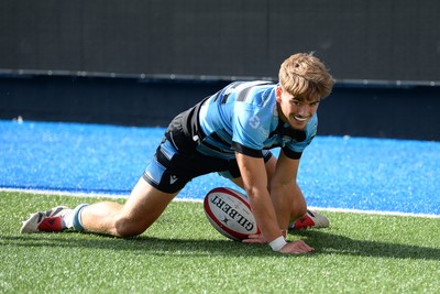 310825 - Cardiff Rugby U18s v RGC U18s - Harvey Bryant of Cardiff dives in to score a try