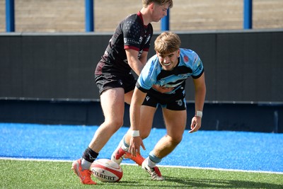 310825 - Cardiff Rugby U18s v RGC U18s - Harvey Bryant of Cardiff dives in to score a try