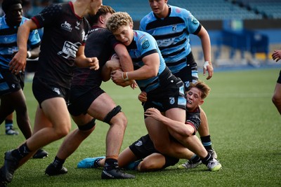 310825 - Cardiff Rugby U18s v RGC U18s - Iestyn Stephens of Cardiff pushes the ball over to score a try