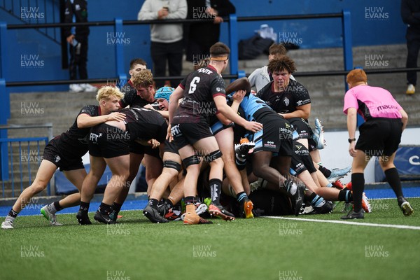 310825 - Cardiff Rugby U18s v RGC U18s - Cardiff push the scrum over the line to score a try