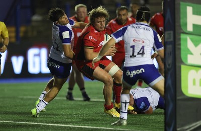 060924 - Cardiff Rugby v Bath Rugby, Pre-season Friendly - Dan Thomas of Cardiff Rugby powers over to score the second try