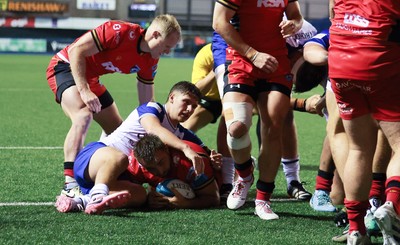 060924 - Cardiff Rugby v Bath Rugby, Pre-season Friendly - Liam Belcher of Cardiff Rugby powers over to score try