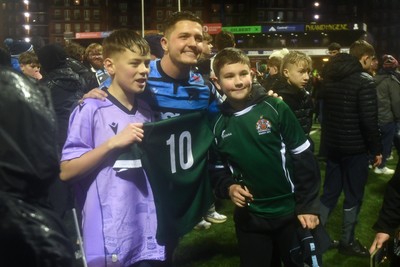 240126 - Cardiff Rugby v Benetton Rugby - United Rugby Championship - Callum Sheedy of Cardiff Rugby with fans at full time