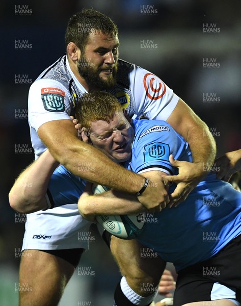 161021 - Cardiff Rugby v Cell C Sharks - United Rugby Championship - Rhys Carre of Cardiff is tackled by Thomas du Toit of Sharks
