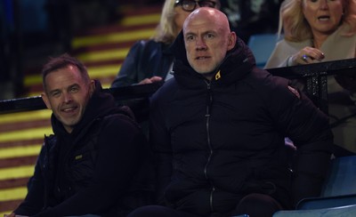 111025 - Cardiff Rugby v Connacht Rugby, United Rugby Championship - Wales senior mens coach Danny Wilson, left, and head coach Steve Tandy watch the match