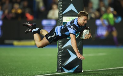 111025 - Cardiff Rugby v Connacht Rugby, United Rugby Championship -Tom Bowen of Cardiff Rugby dives in to score try