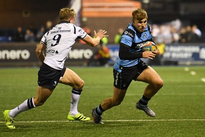 111025 - Cardiff Rugby v Connacht - United Rugby Championship - Jacob Beetham of Cardiff Rugby is challenged by Ben Murphy of Connacht