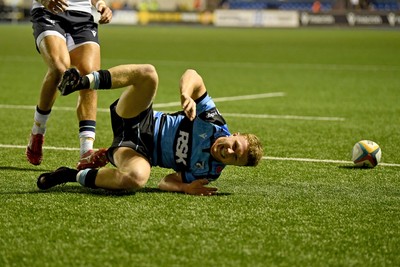 111025 - Cardiff Rugby v Connacht - United Rugby Championship - Tom Bowen of Cardiff Rugby scores a try