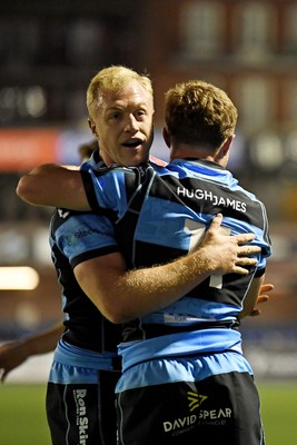 111025 - Cardiff Rugby v Connacht - United Rugby Championship - Tom Bowen of Cardiff Rugby celebrates scoring a try with Johan Mulder of Cardiff Rugby