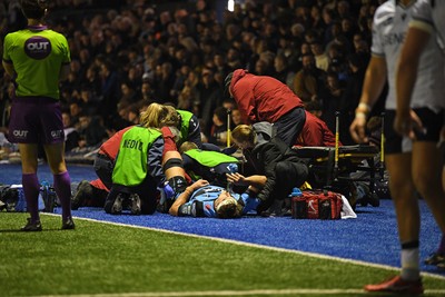 111025 - Cardiff Rugby v Connacht - United Rugby Championship - Teddy Williams of Cardiff Rugby receives treatment on the side of the pitch before being taken off in a stretcher