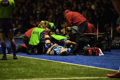 111025 - Cardiff Rugby v Connacht - United Rugby Championship - Teddy Williams of Cardiff Rugby receives treatment on the side of the pitch before being taken off in a stretcher