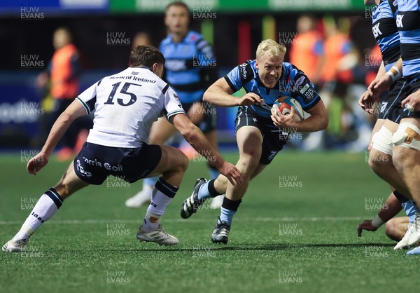 111025 - Cardiff Rugby v Connacht Rugby, United Rugby Championship - Johan Mulder of Cardiff Rugby takes on Sean Naughton of Connacht Rugby