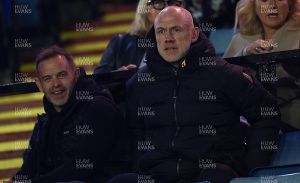 111025 - Cardiff Rugby v Connacht Rugby, United Rugby Championship - Wales senior mens coach Danny Wilson, left, and head coach Steve Tandy watch the match