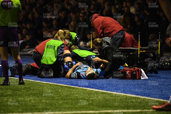 111025 - Cardiff Rugby v Connacht - United Rugby Championship - Teddy Williams of Cardiff Rugby receives treatment on the side of the pitch before being taken off in a stretcher