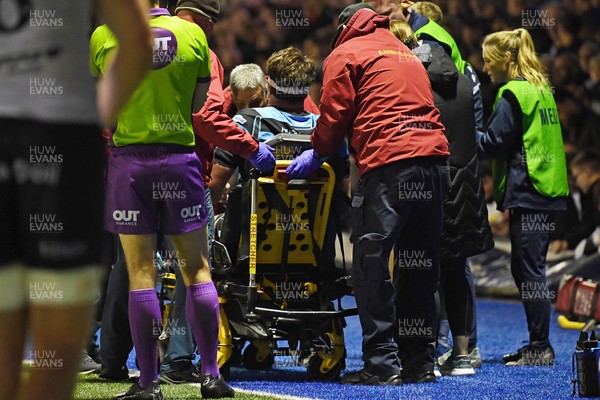 111025 - Cardiff Rugby v Connacht - United Rugby Championship - Teddy Williams of Cardiff Rugby receives treatment on the side of the pitch before being taken off in a stretcher