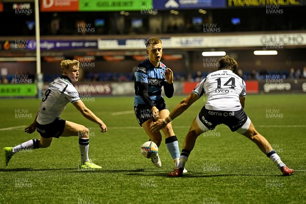 111025 - Cardiff Rugby v Connacht - United Rugby Championship - Cam Winnett of Cardiff Rugby is challenged by Chay Mullins of Connacht