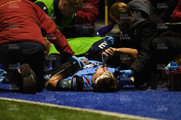 111025 - Cardiff Rugby v Connacht - United Rugby Championship - Teddy Williams of Cardiff Rugby receives treatment on the side of the pitch before being taken off in a stretcher