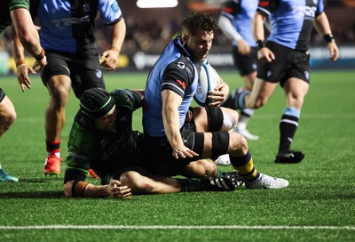 170224 - Cardiff Rugby v Connacht Rugby, United Rugby Championship - Thomas Young of Cardiff Rugby is tackled short of the line