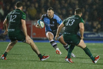 170224 - Cardiff Rugby v Connacht - United Rugby Championship - Owen Lane of Cardiff takes on Cathal Forde and David Hawkshaw of Connacht