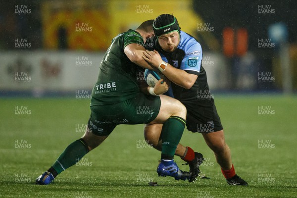 170224 - Cardiff Rugby v Connacht - United Rugby Championship - Ciaran Parker of Cardiff is tackled by Peter Dooley of Connacht