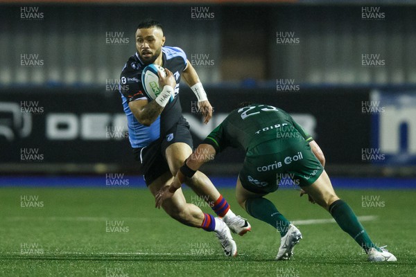 170224 - Cardiff Rugby v Connacht - United Rugby Championship - Uilisi Halaholo of Cardiff takes on Tom Farrell of Connacht