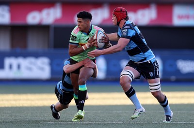 150526 - Cardiff Rugby v DHL Stormers - United Rugby Championship - Sacha Feinberg-Mngomezulu of Stormers is tackled by Johan Mulder and James Botham of Cardiff 