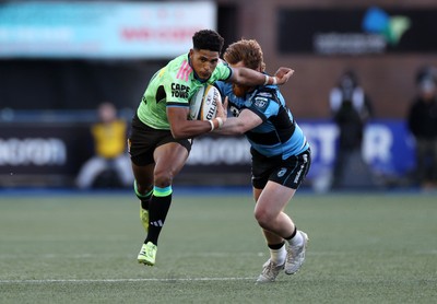 150526 - Cardiff Rugby v DHL Stormers - United Rugby Championship - Sacha Feinberg-Mngomezulu of Stormers gets past Rory Jennings of Cardiff 
