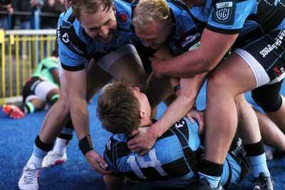 150526 - Cardiff Rugby v DHL Stormers - United Rugby Championship - Jacob Beetham of Cardiff celebrates scoring a try with team mates