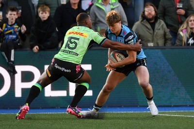 150526 - Cardiff Rugby v DHL Stormers - United Rugby Championship - Jacob Beetham of Cardiff Rugby is challenged by Damian Willemse of Stormers