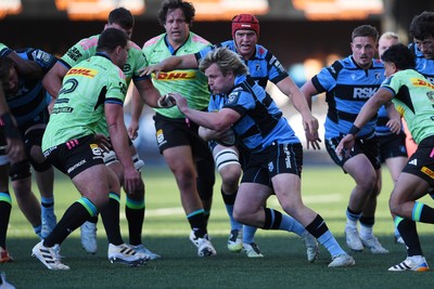 150526 - Cardiff Rugby v DHL Stormers - United Rugby Championship - Dan Thomas of Cardiff Rugby is challenged by Andre-Hugo Venter of Stormers