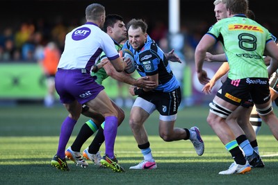 150526 - Cardiff Rugby v DHL Stormers - United Rugby Championship - Ioan Lloyd of Cardiff Rugby is challenged by Sacha Feinberg-Mngomezulu of Stormers