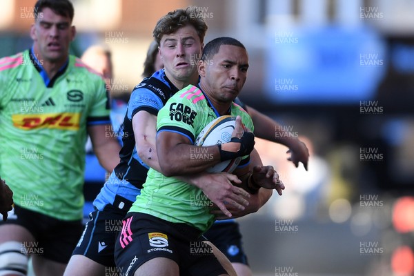 150526 - Cardiff Rugby v DHL Stormers - United Rugby Championship - Suleiman Hartzenberg of Stormers is challenged by Jacob Beetham of Cardiff Rugby