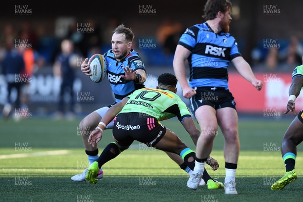 150526 - Cardiff Rugby v DHL Stormers - United Rugby Championship - Ioan Lloyd of Cardiff Rugby is challenged by Sacha Feinberg-Mngomezulu of Stormers