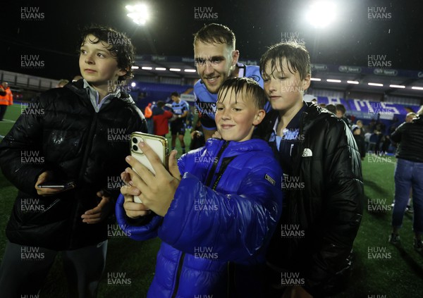221022 - Cardiff Rugby v DHL Stormers - BKT United Rugby Championship - Max Llewellyn of Cardiff with fans at full time